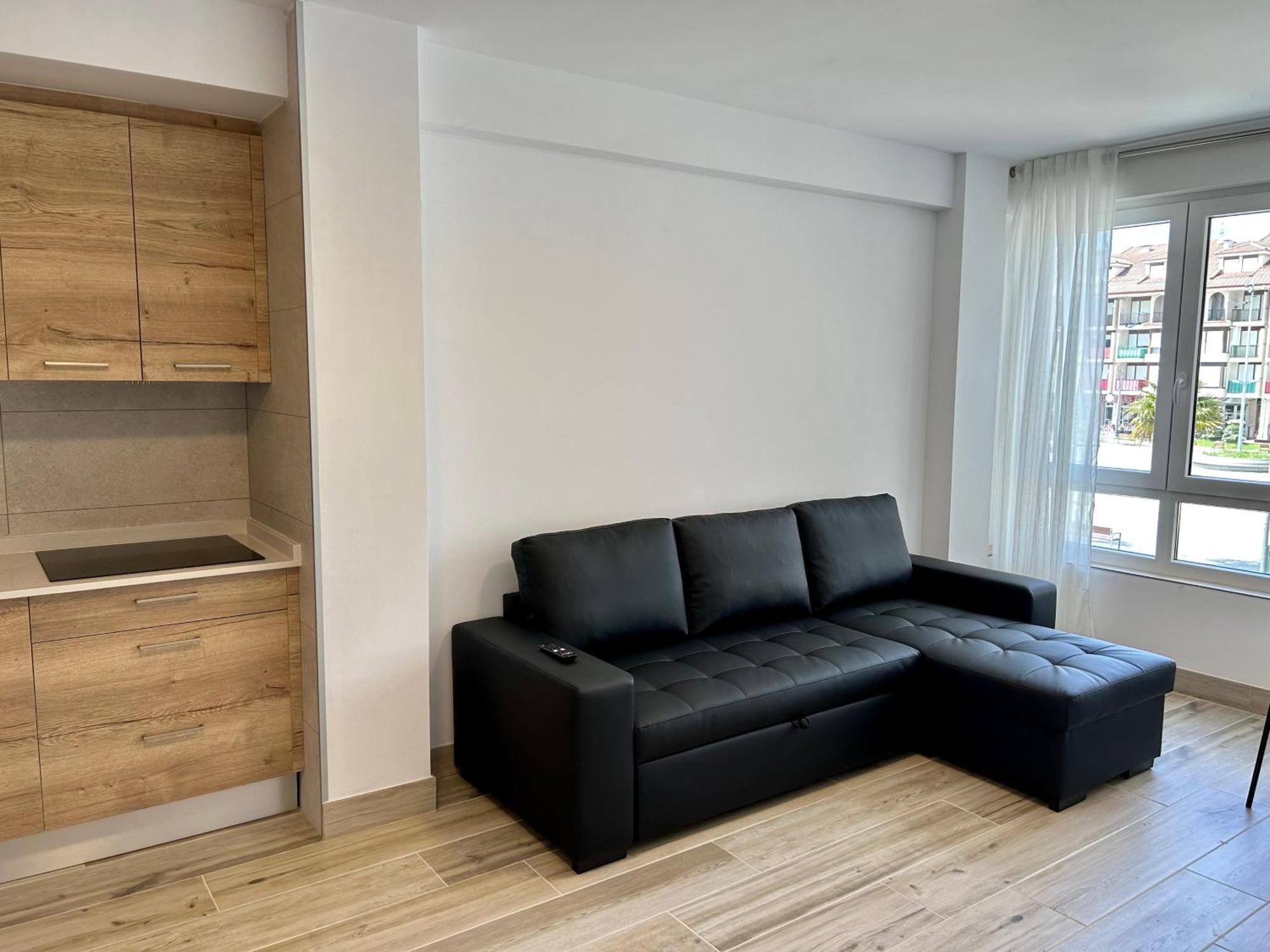 Apartamento Plaza De La Villa Playa Trengandin Noja Bagian luar foto