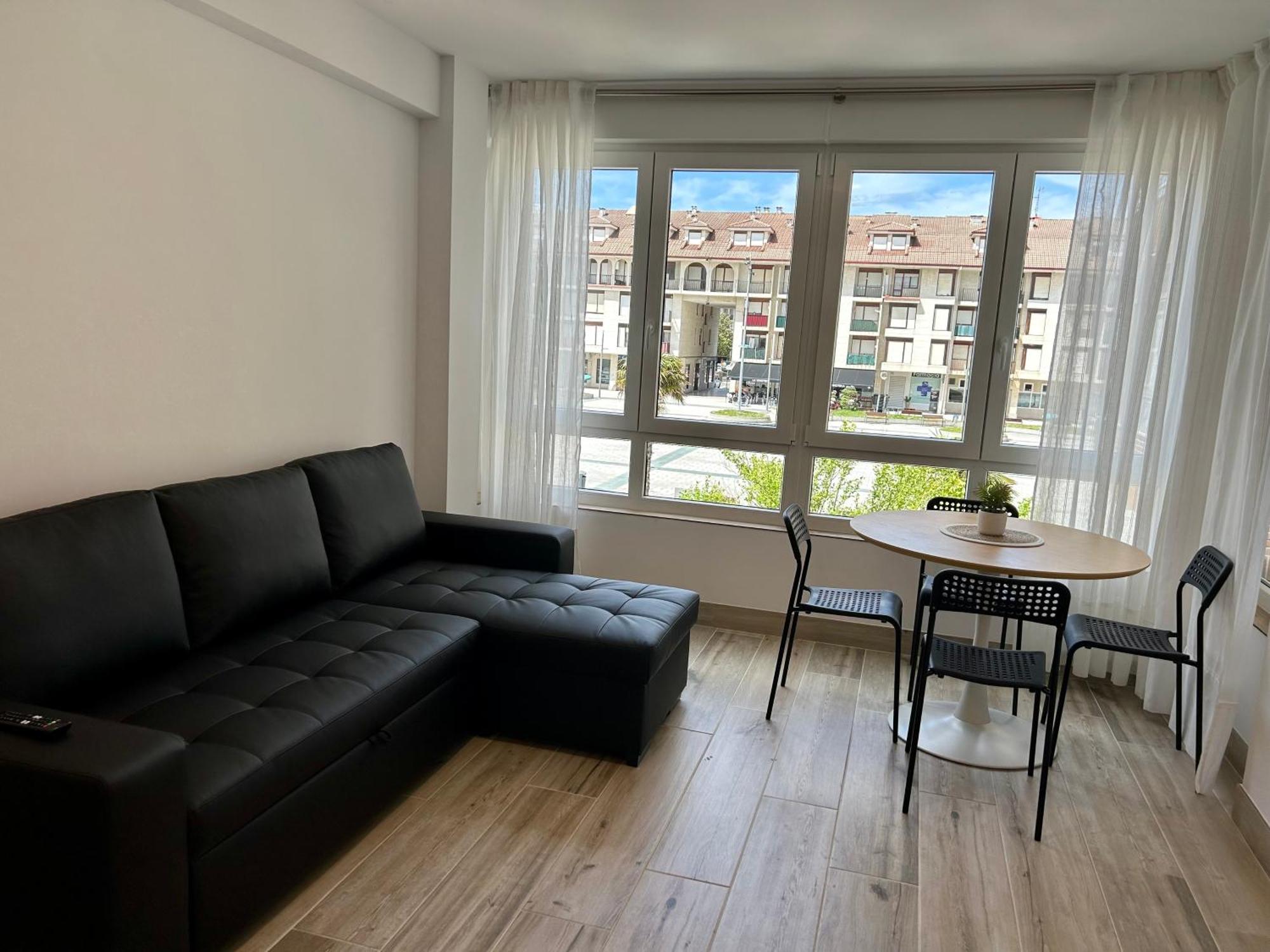 Apartamento Plaza De La Villa Playa Trengandin Noja Bagian luar foto